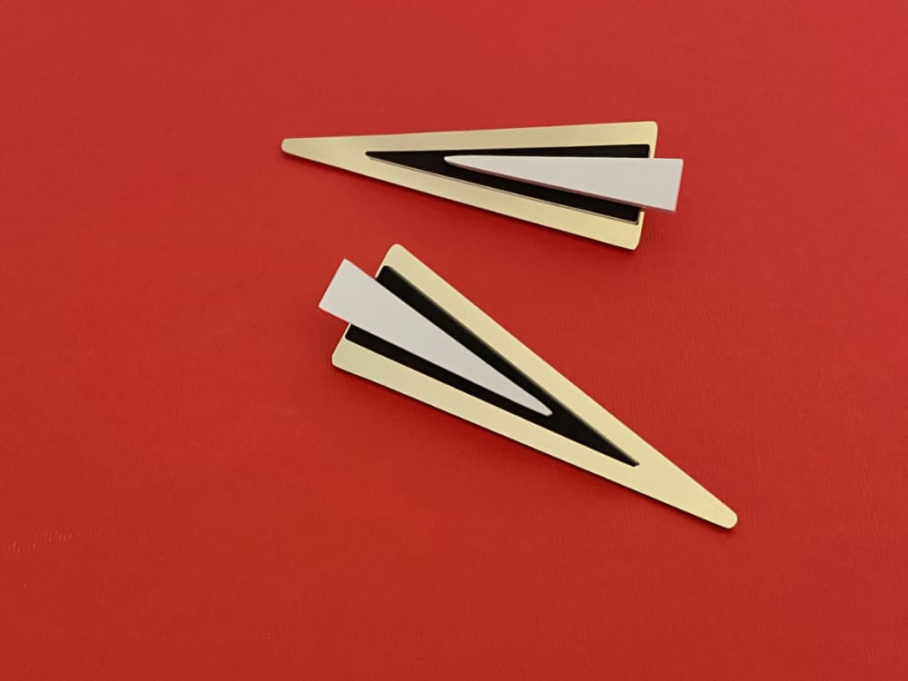 brass design triangle earrings by plexi shock