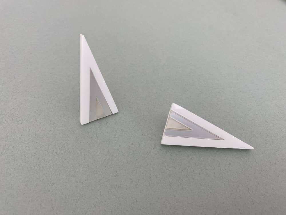 white plexiglass triangle earrings