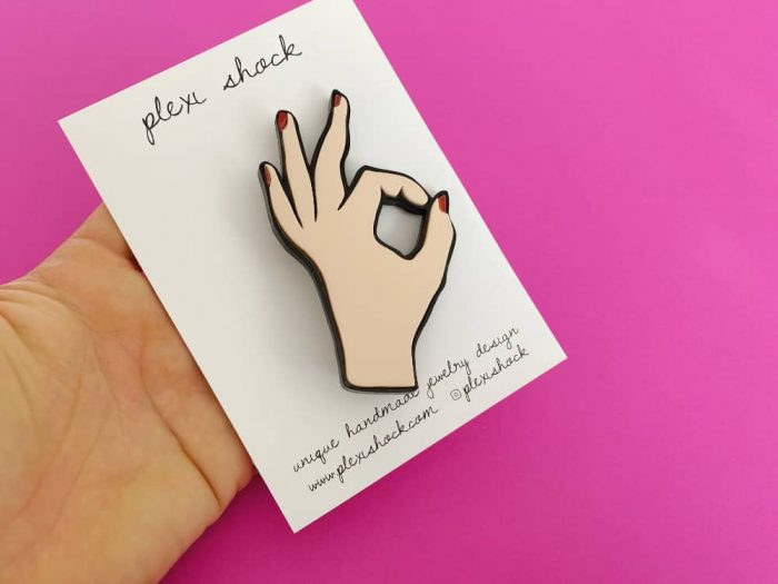 OK brooch by plexi shock