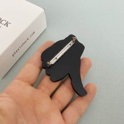thumb down brooch