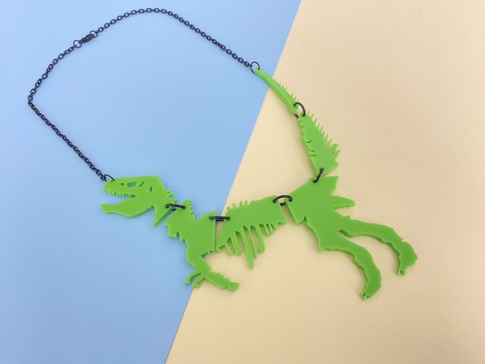 acid green dinosaur necklace