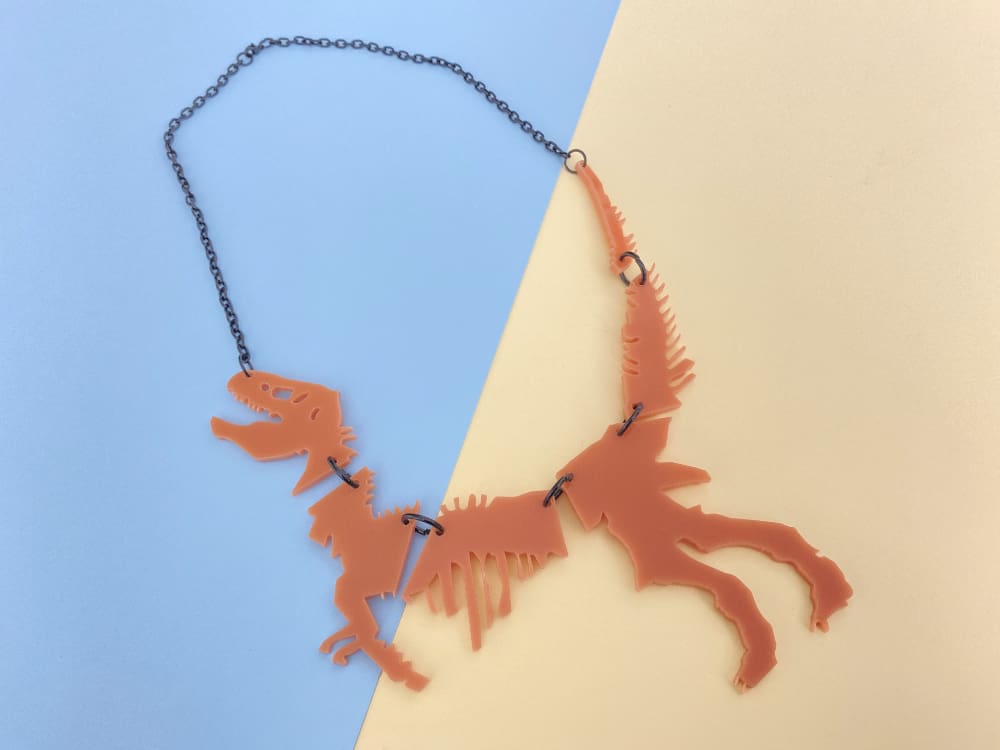 salmon dinosaur necklace