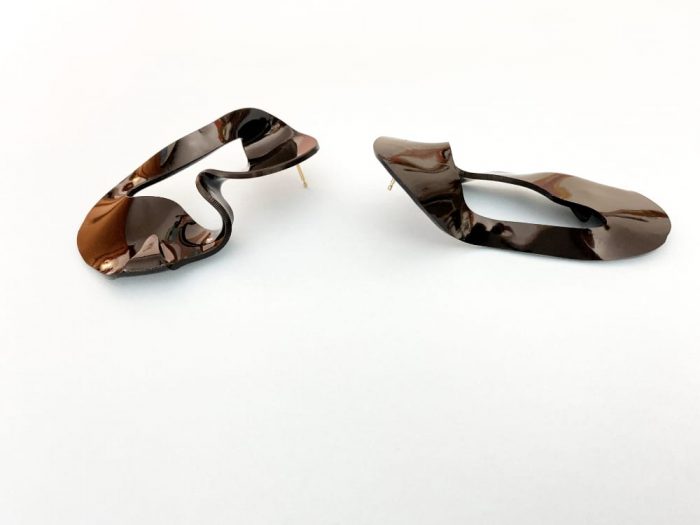 black experimental design earrings