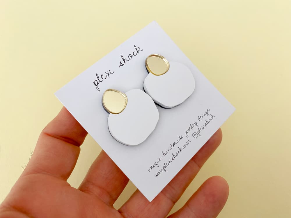 irregular white gold acrylic earrings