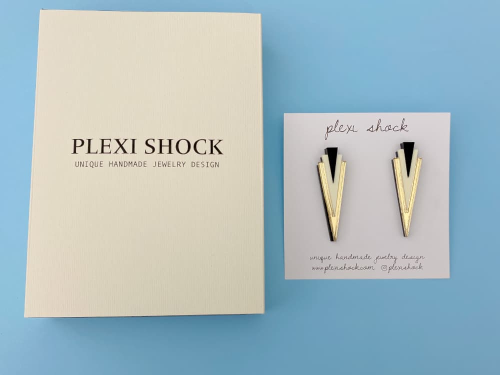 gold cream black triangle earrings by plexi shock