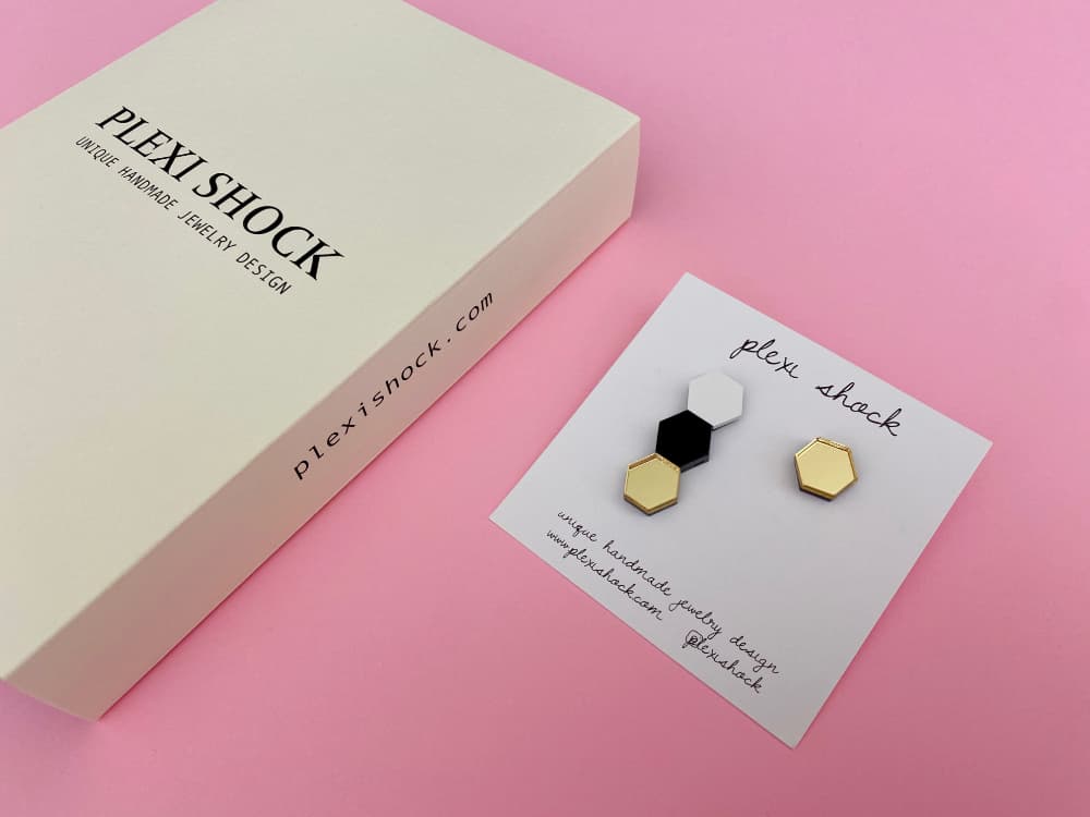 black gold white asymmetric earrings by plexi shock